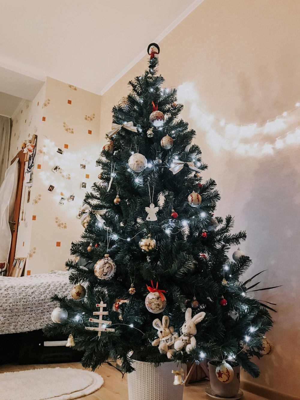 green Christmas tree with decorations