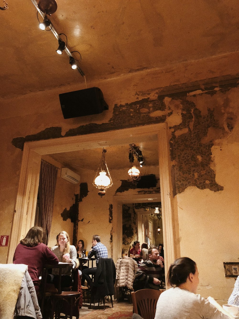 people sitting inside room with lights