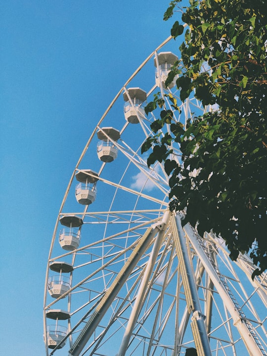 white steel Ferris wheel in Bucharest Romania
