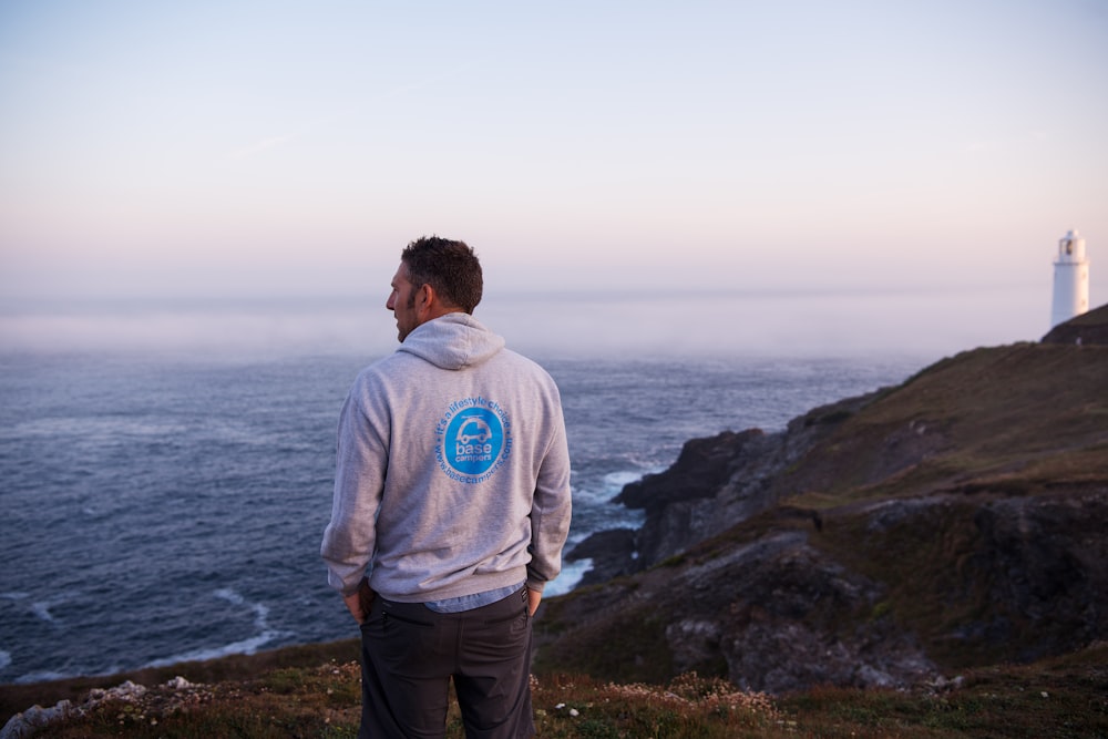 man standing near sea