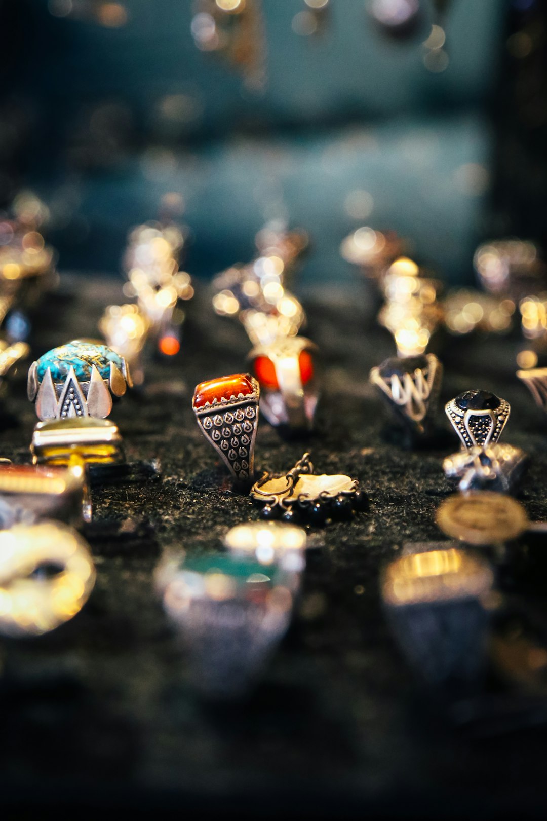 selective focus photography of silver-colored ring