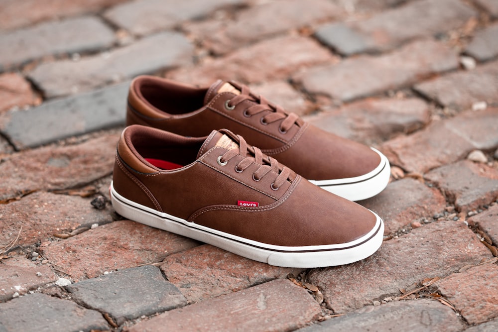 pair of brown sneakers