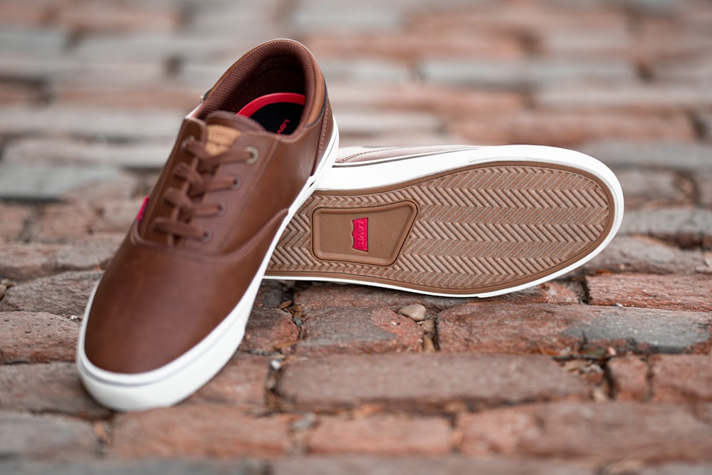 pair of brown Levi's low-top shoes