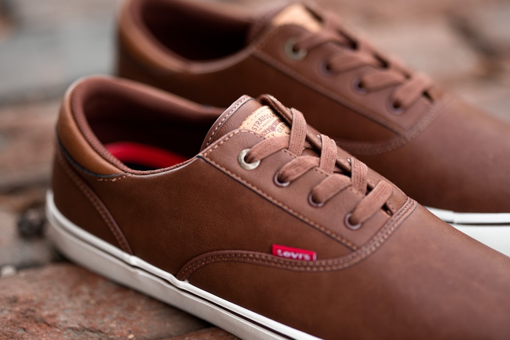 pair of brown Levi's low-top shoes