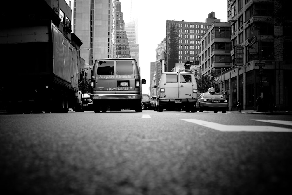 greyscale photo of cars