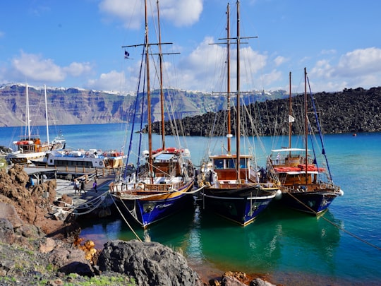 blue canoe boats in Nea Kameni Greece