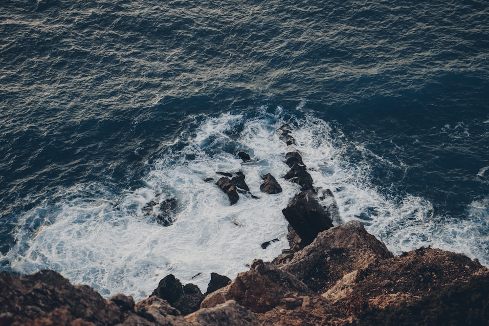 waves crashing on stone