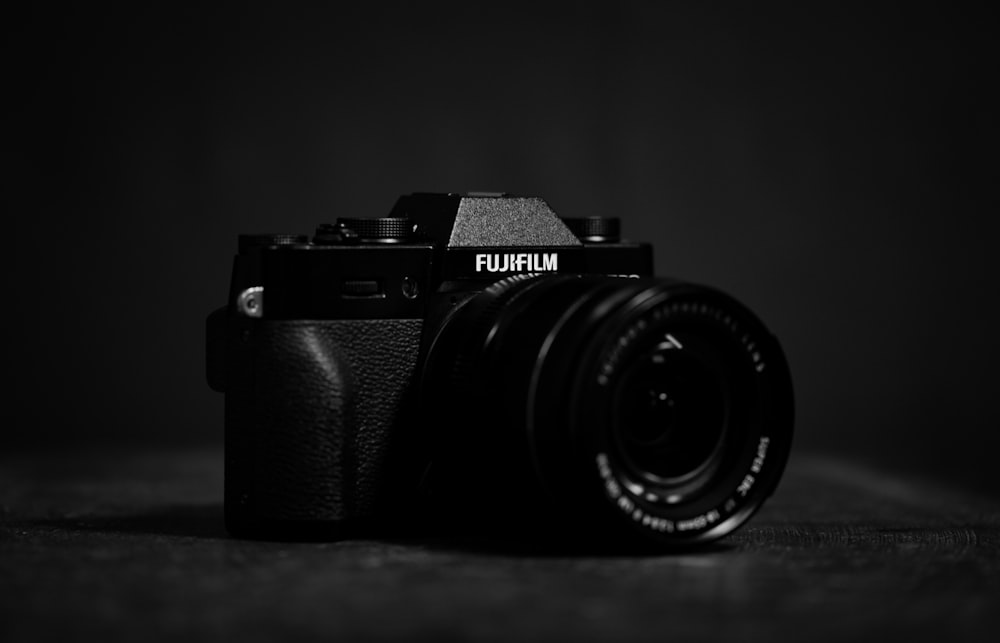 black Fujifilm DSLR camera