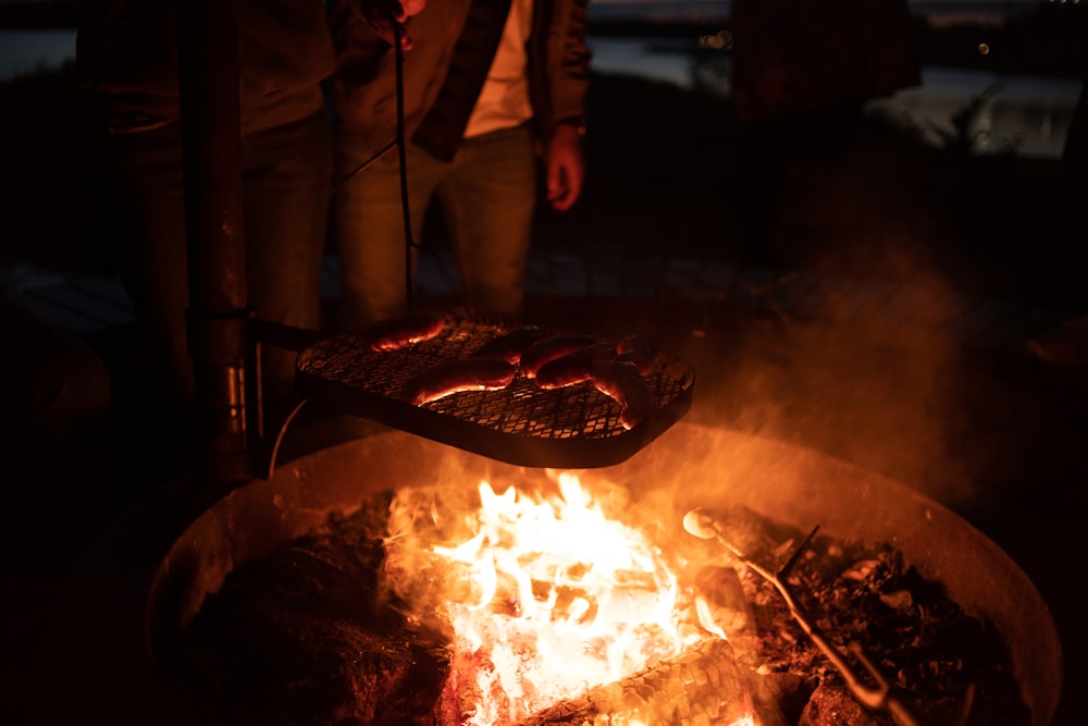 person holding grill