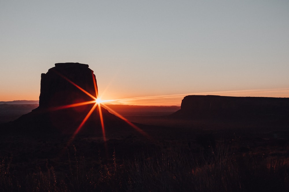 silhouette of building at golden hour