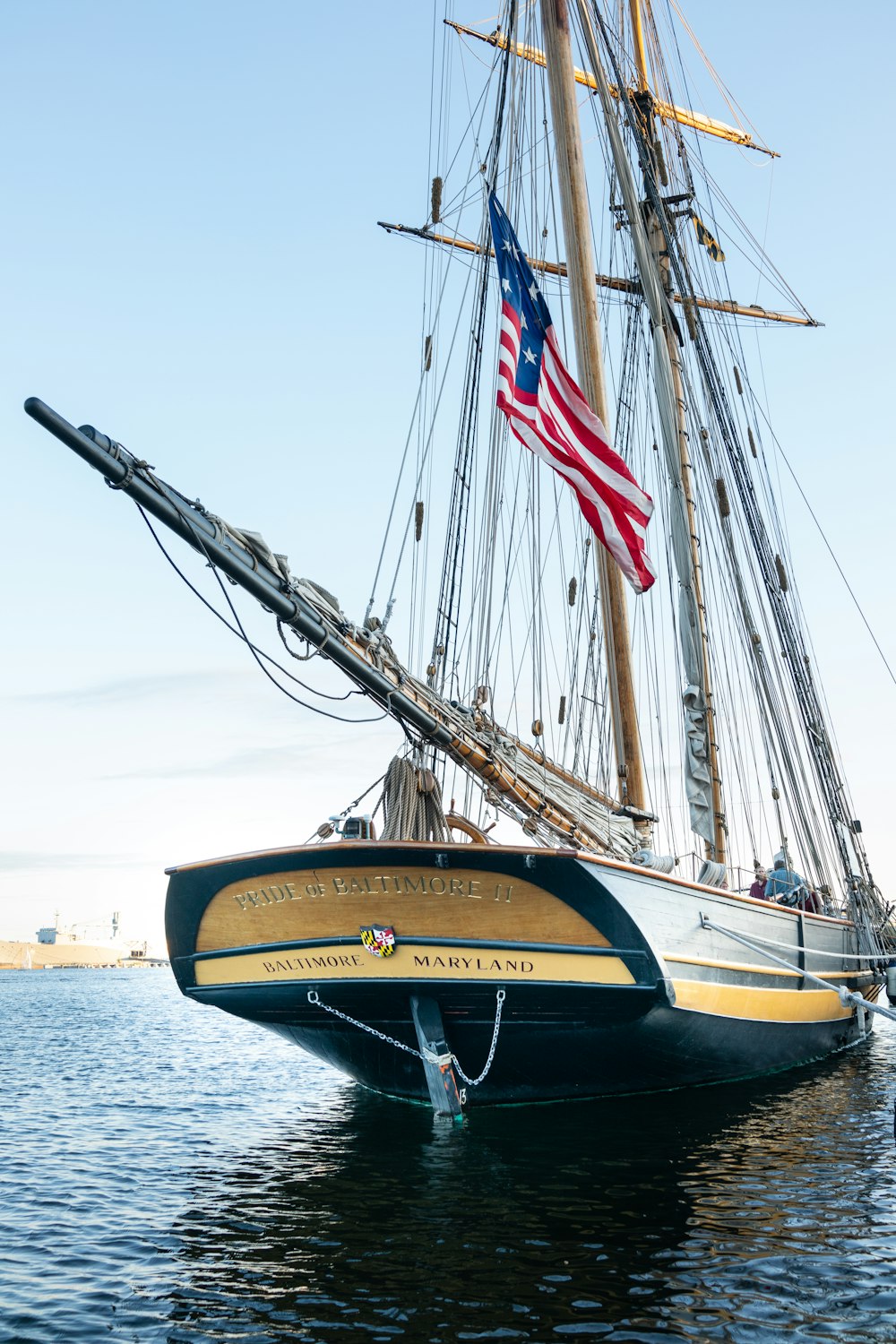 yellow and black sail ship