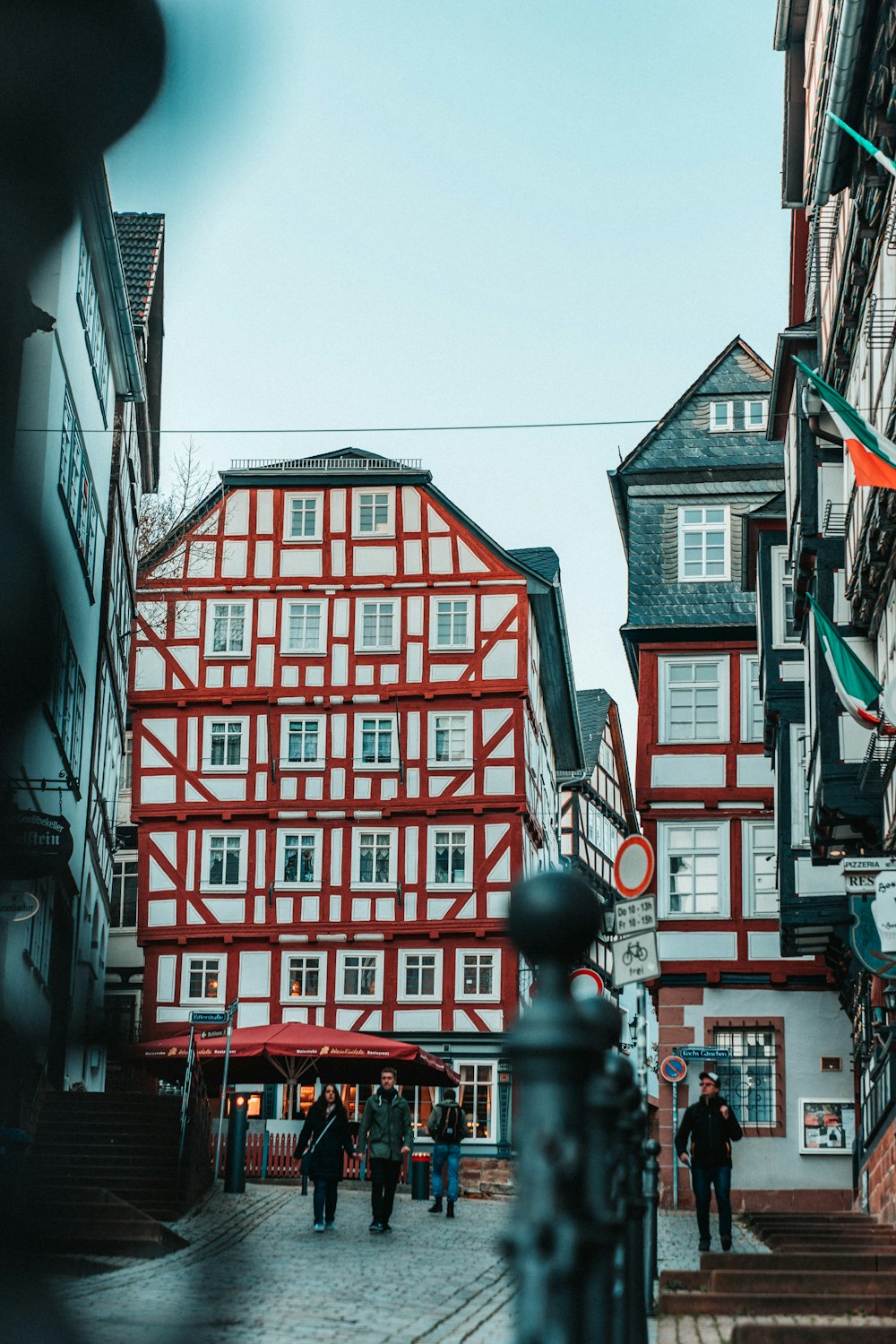 white and red building