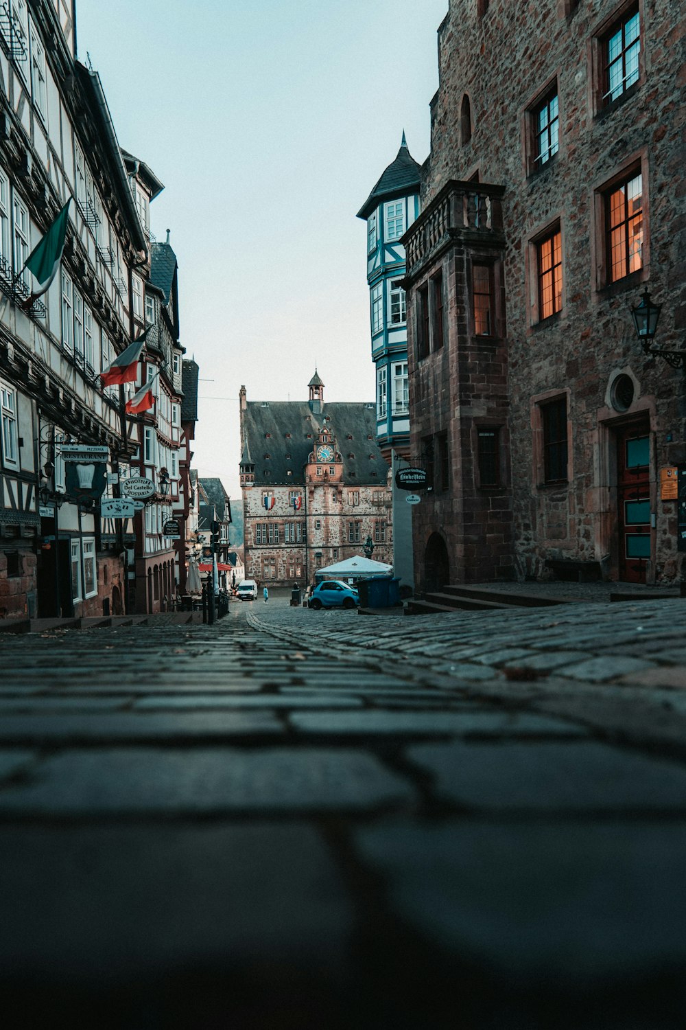 empty road surrounded by buildigs