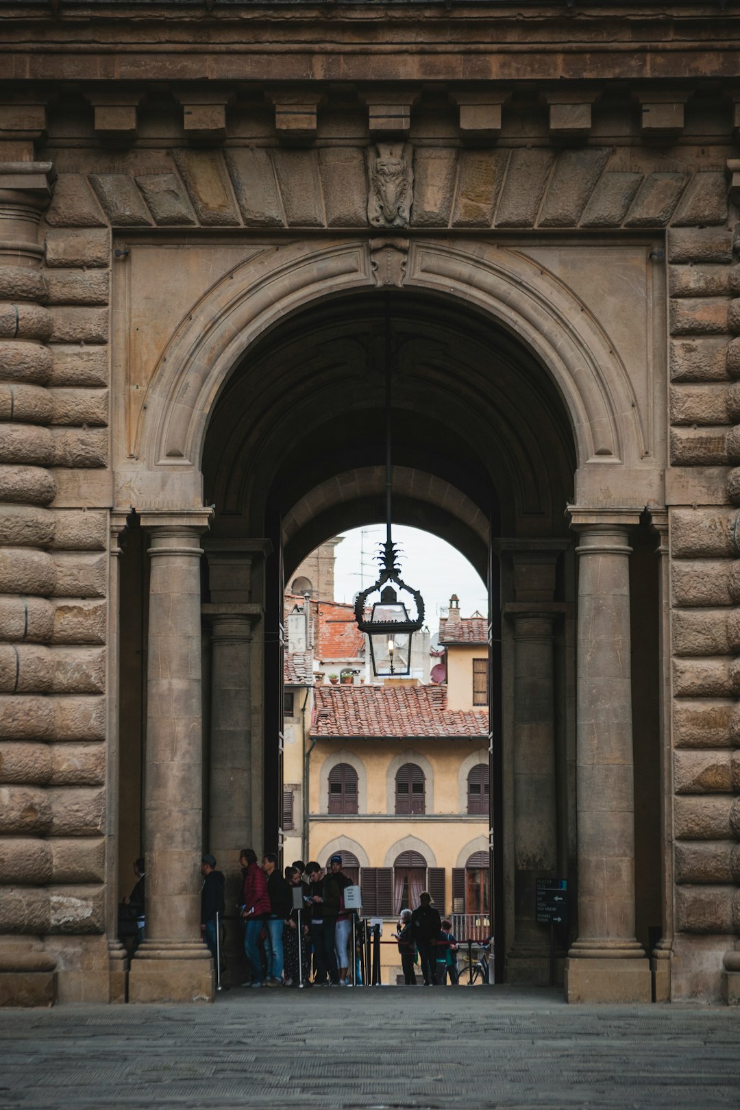 people standing near column