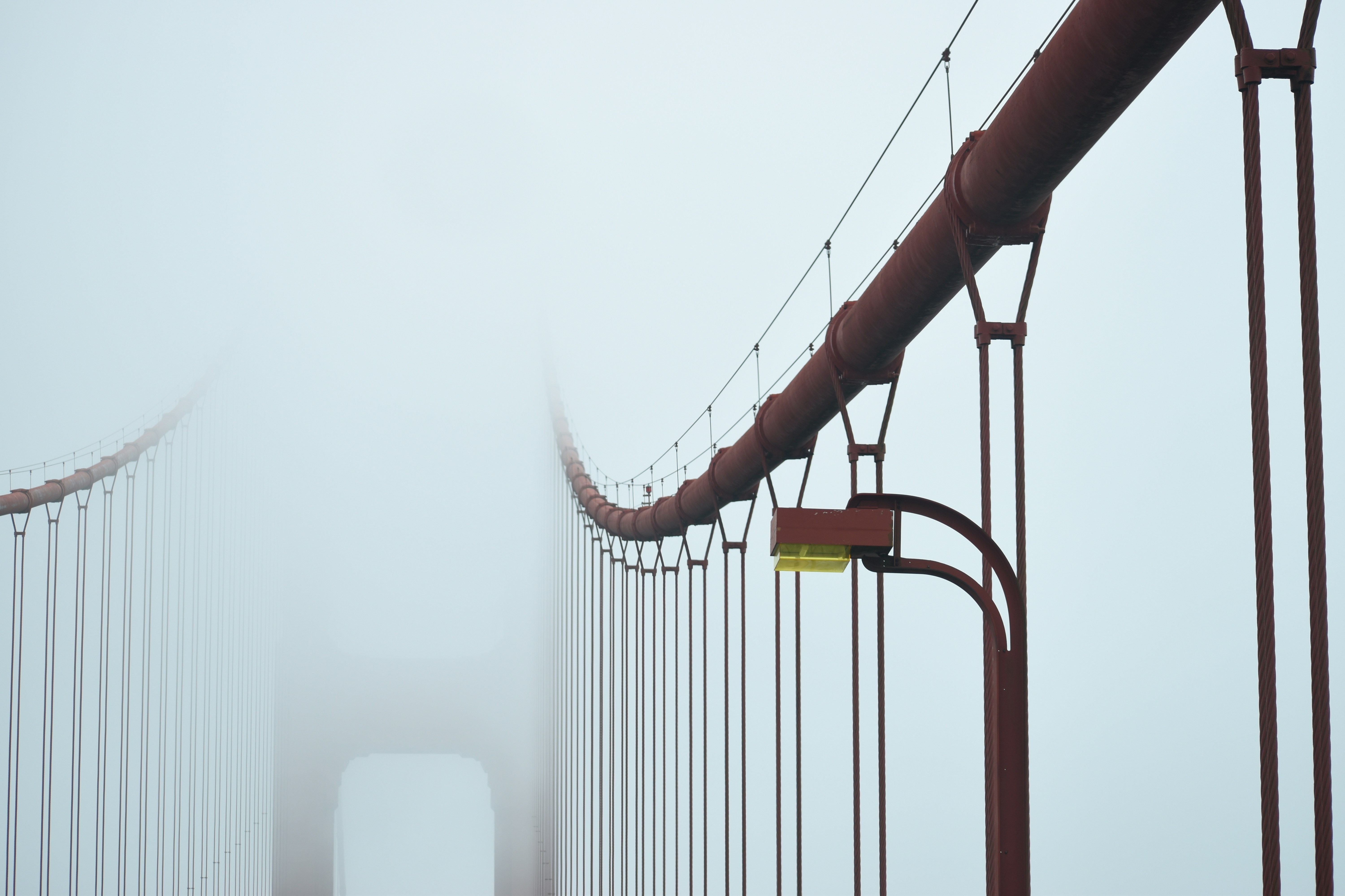 fog covering red bridge bow zoom background