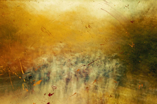 A warm-toned mixed media piece blending textures and colors to create a comforting atmosphere.