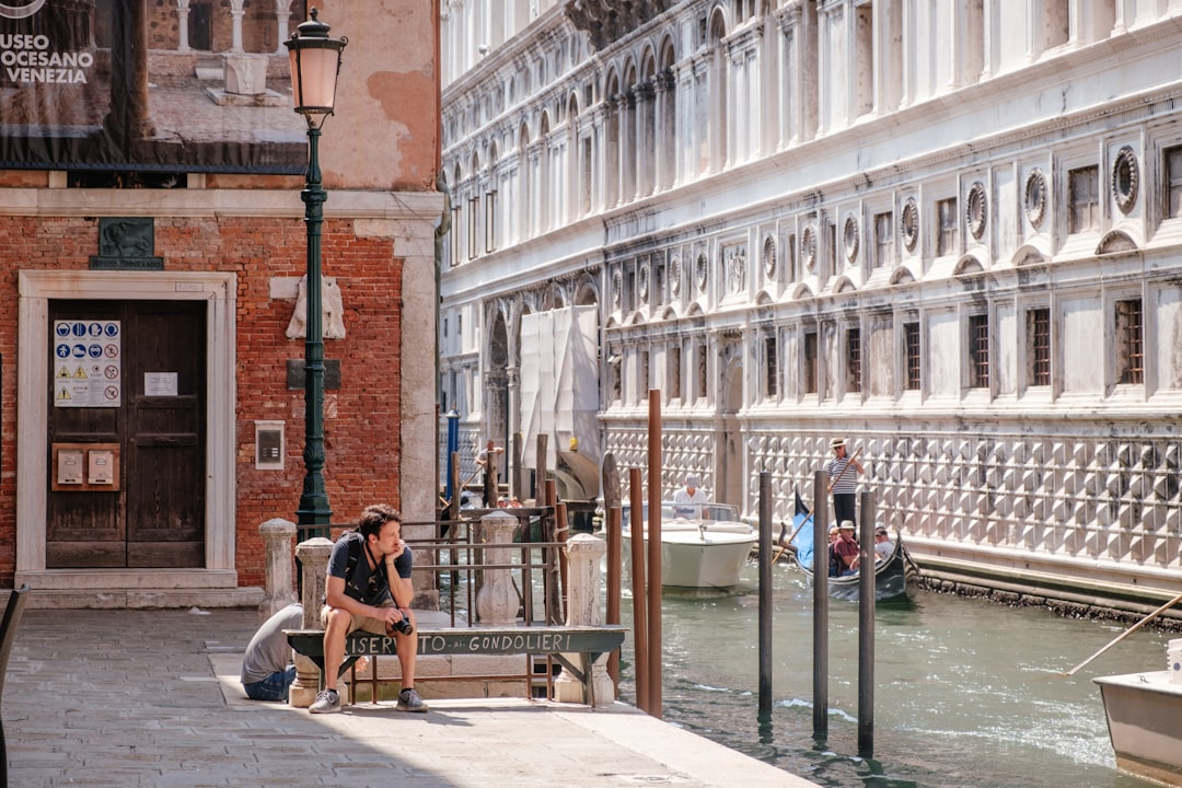 man sitting on bench