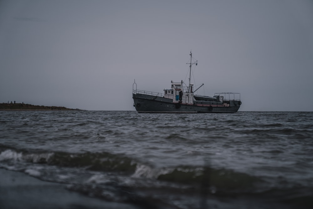 grey ship on sea