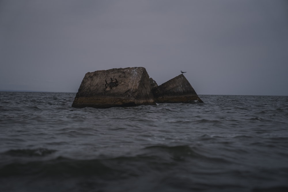 brown island in the middle of ocean