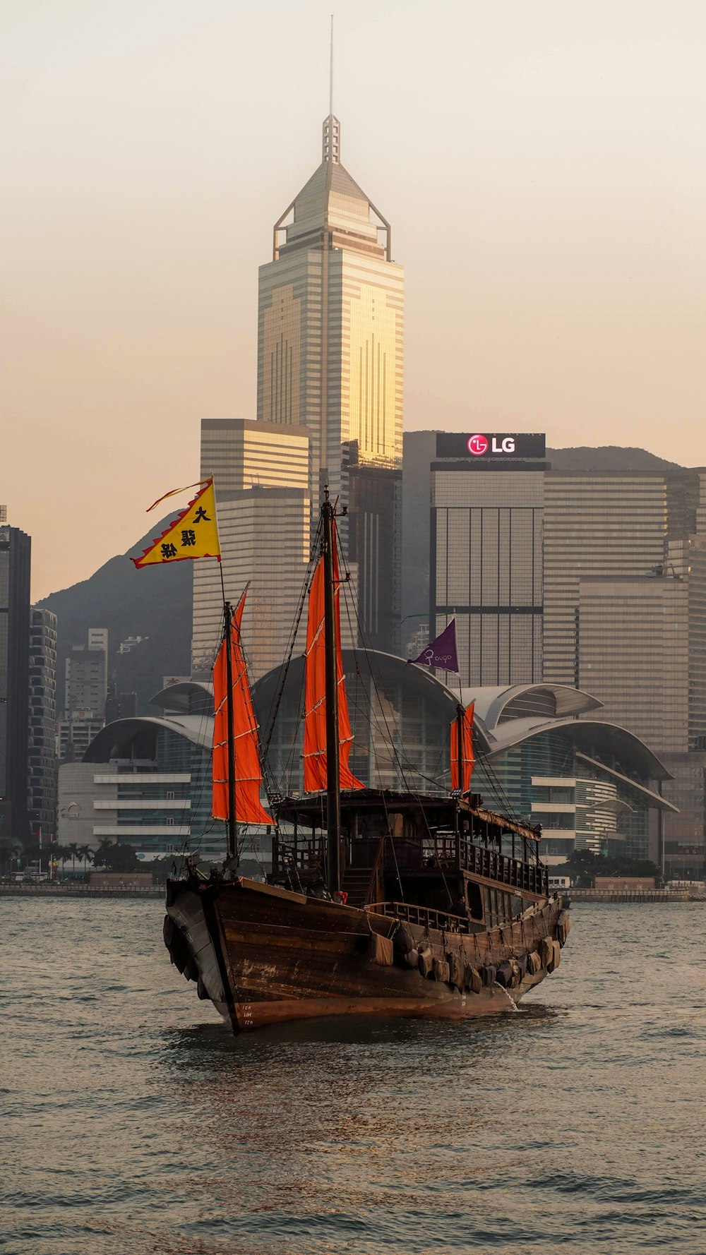 shallow focus photo of brown ship on body of water