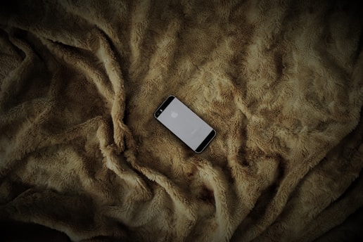 A smartphone screen showing a Furthrive GPS alert with a map of the pet’s location.