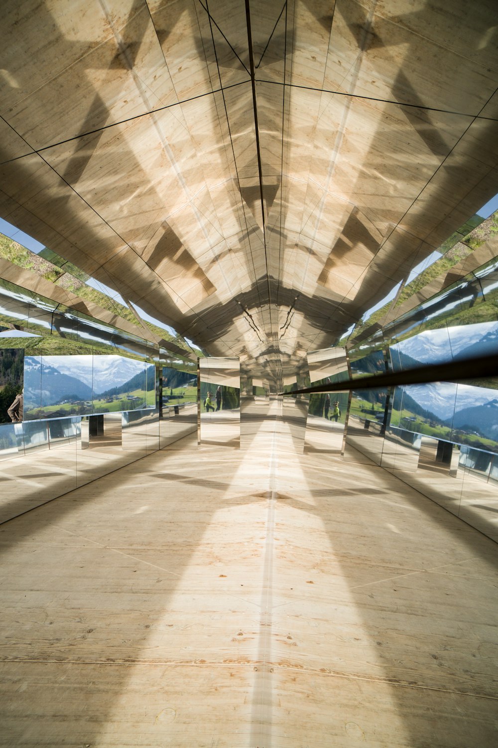 a view of the inside of a building through a mirror