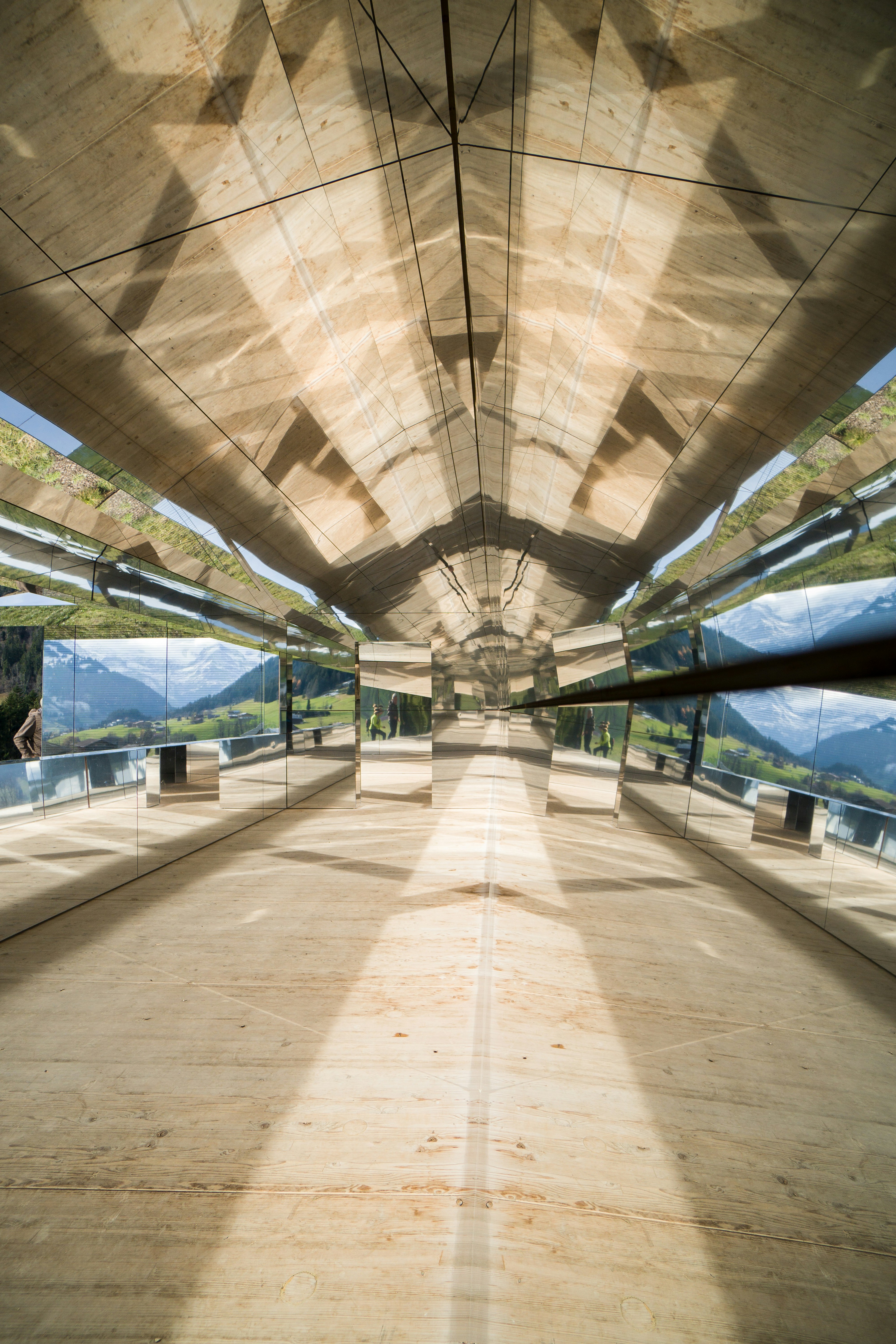 a view of the inside of a building through a mirror