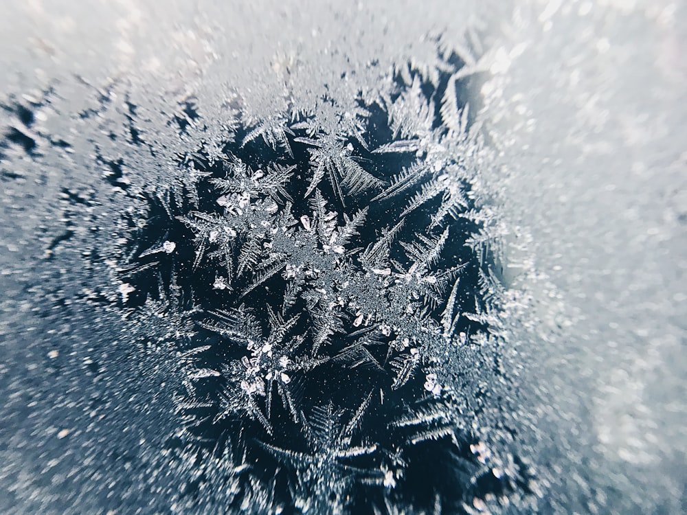 a close up view of a frozen window