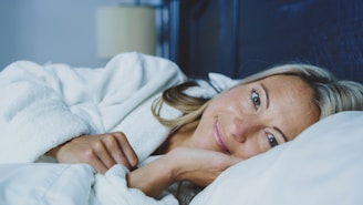 woman lying awake in bed