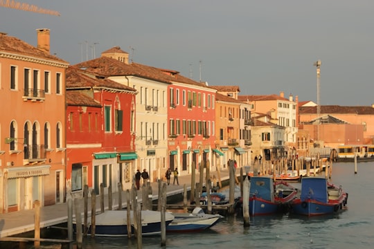 boat by the dock in Canal Grande di Murano Italy