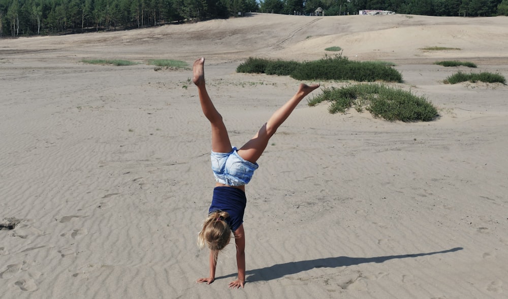 girl doing upside down during daytime