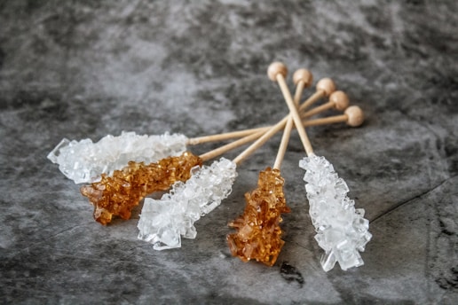 five stones sticks on gray surface