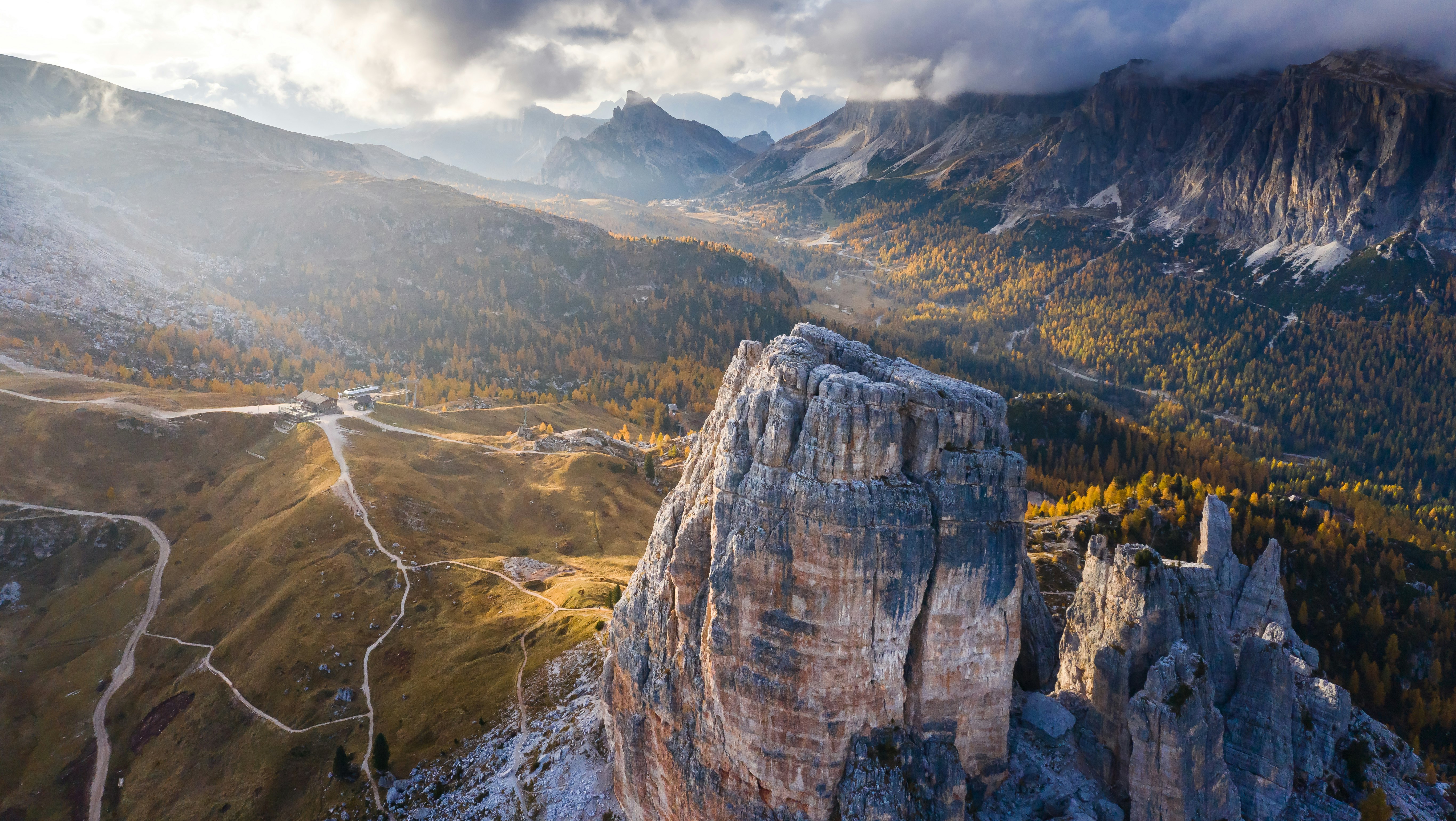 aerial photography of mountain and road