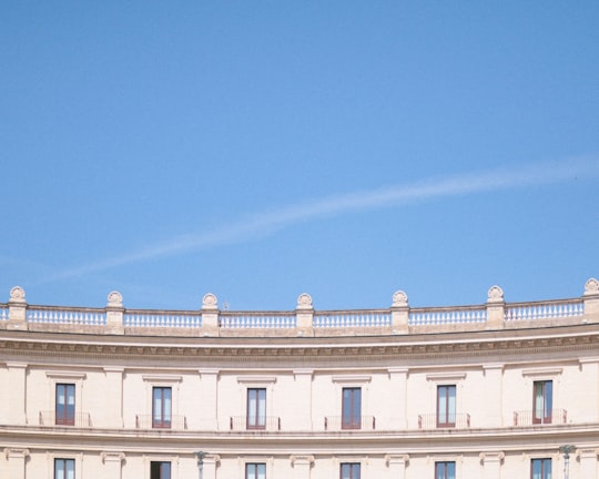 white building during day in Santa Maria degli Angeli e dei Martiri Italy