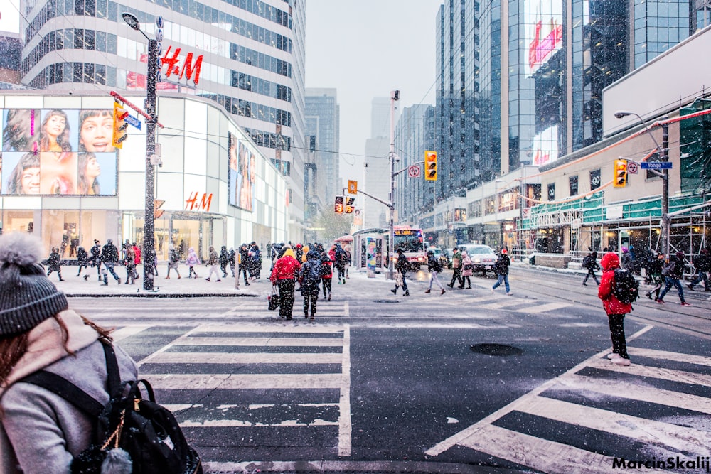 crowd walking on street during daytime