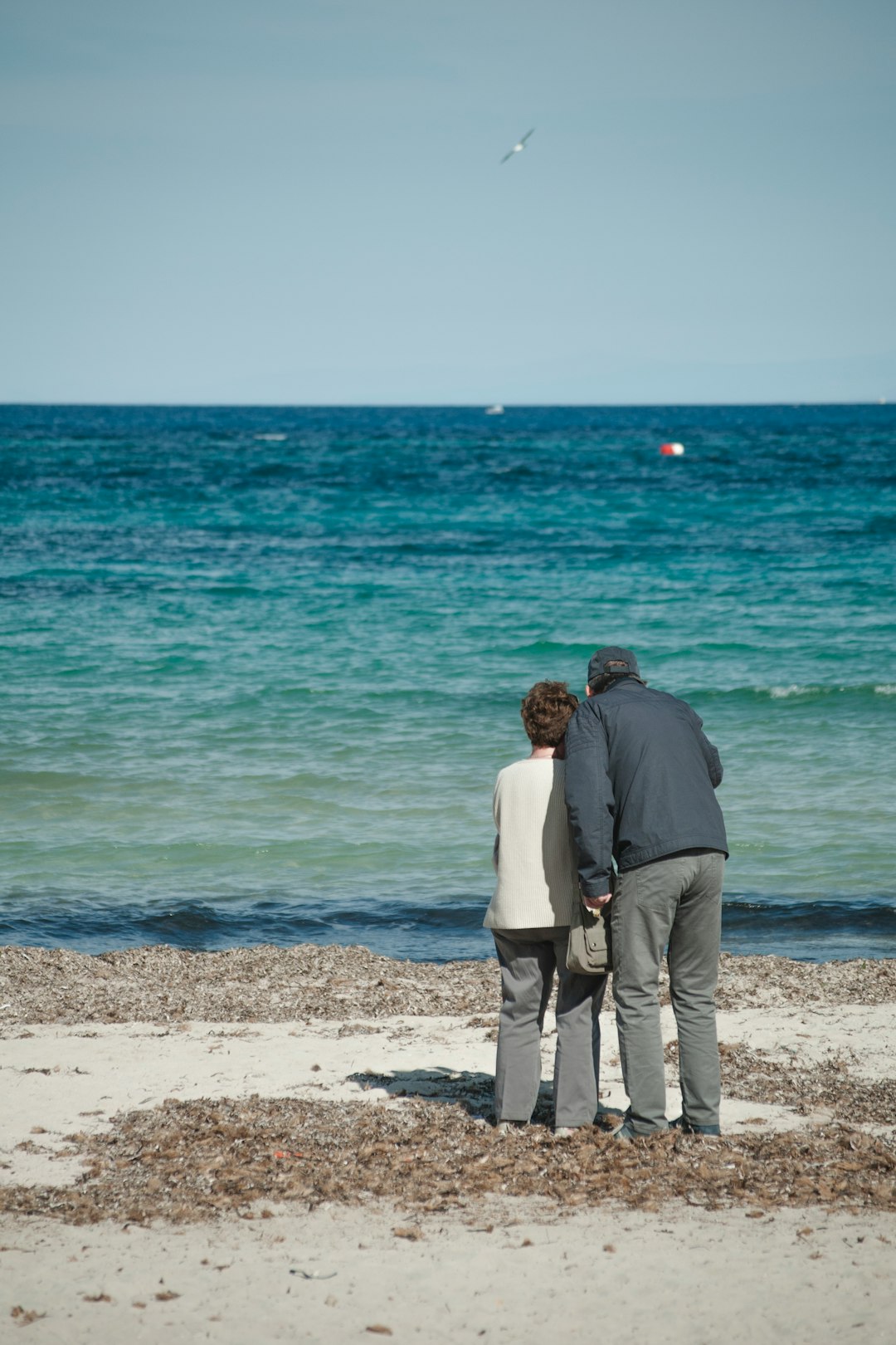 two men near ocean