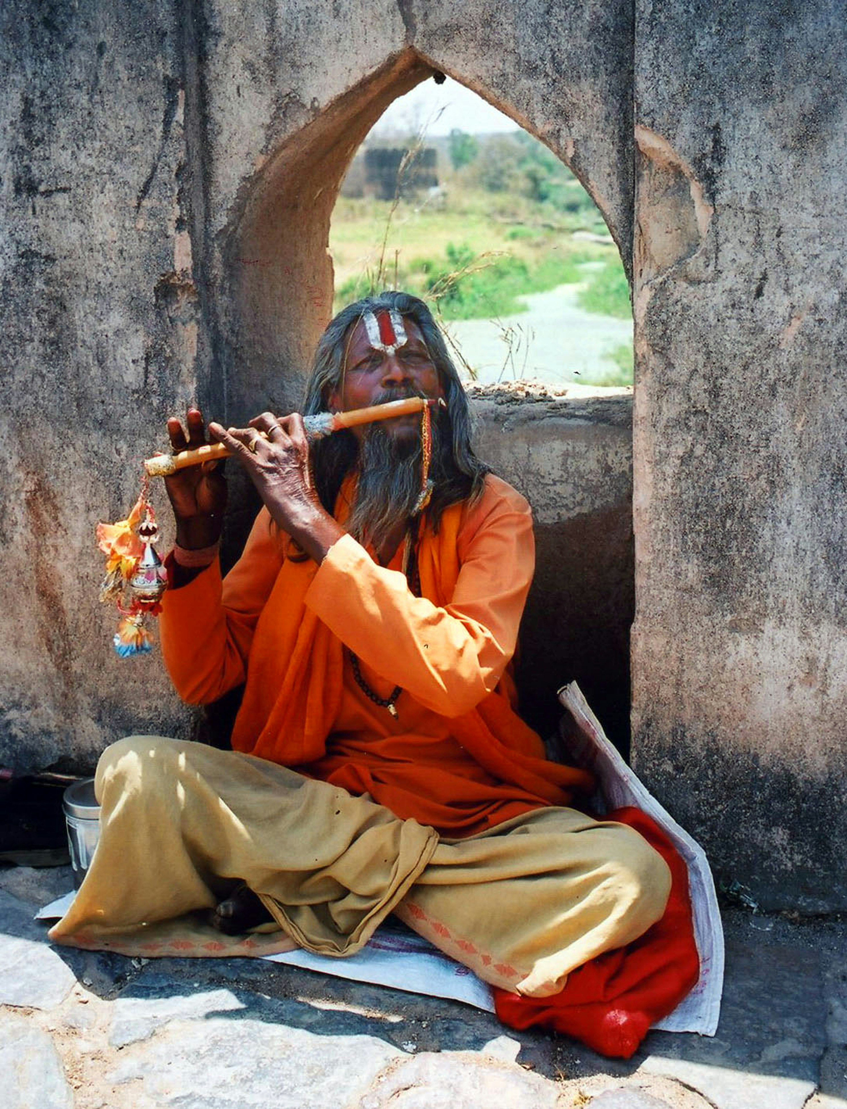 A musician playing a rubab.