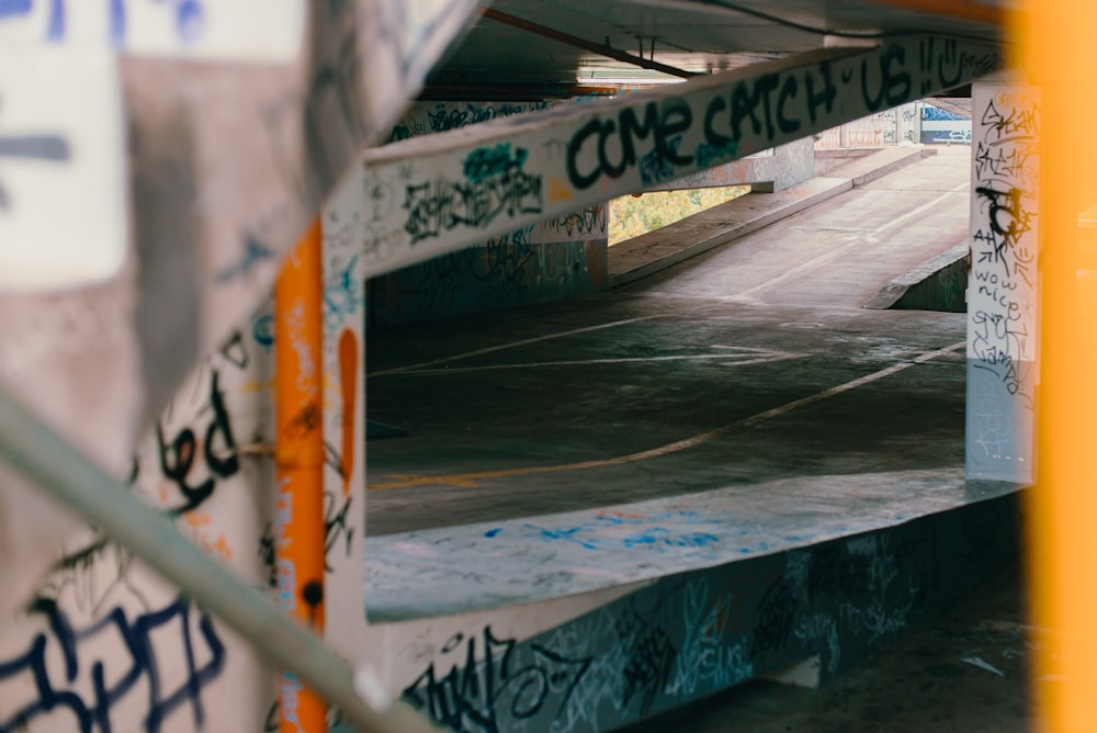 orange post near gray concrete stairs