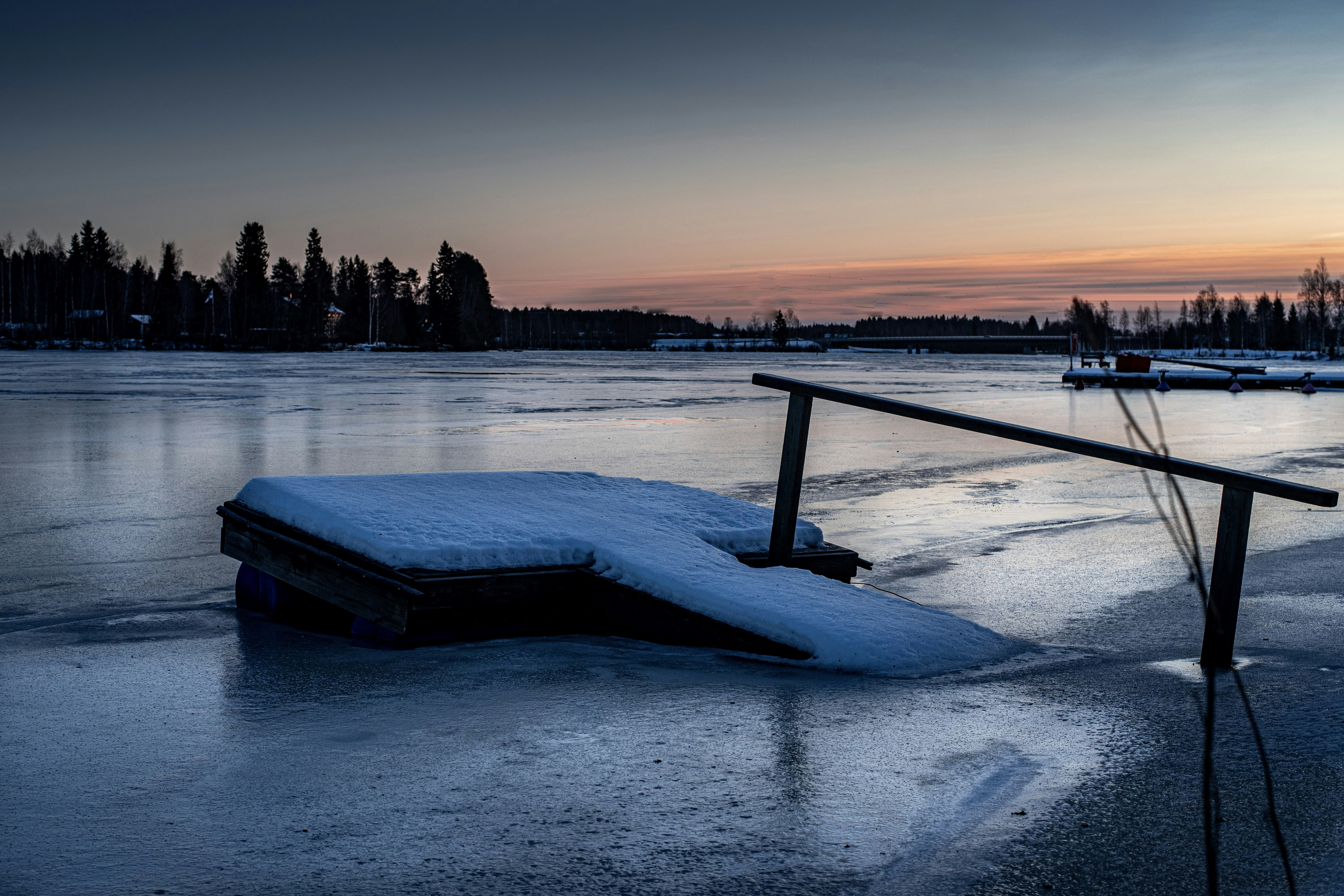 body of water and city during winter