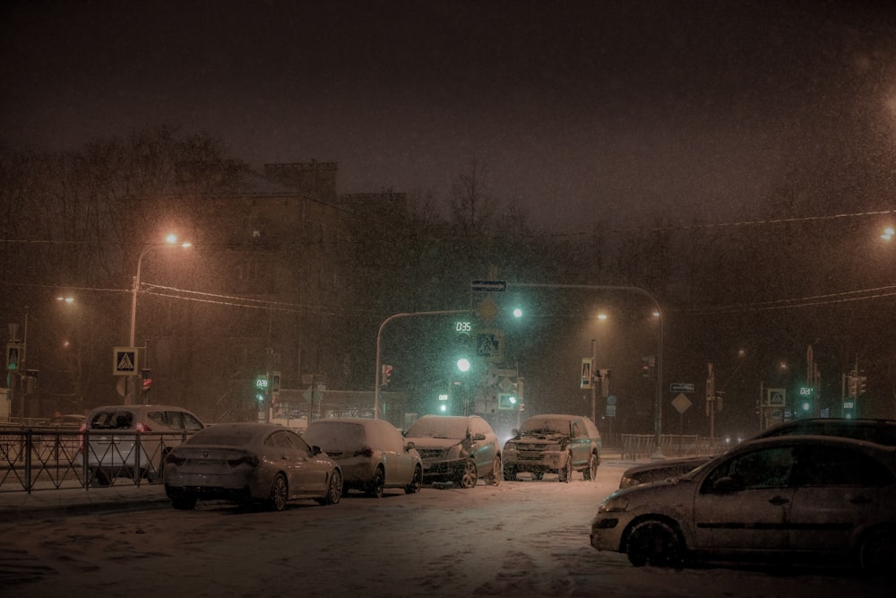 vehicles on road covered with snow