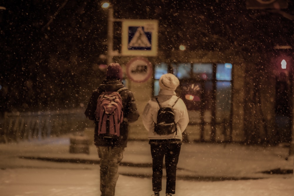 couple walking outside with snow