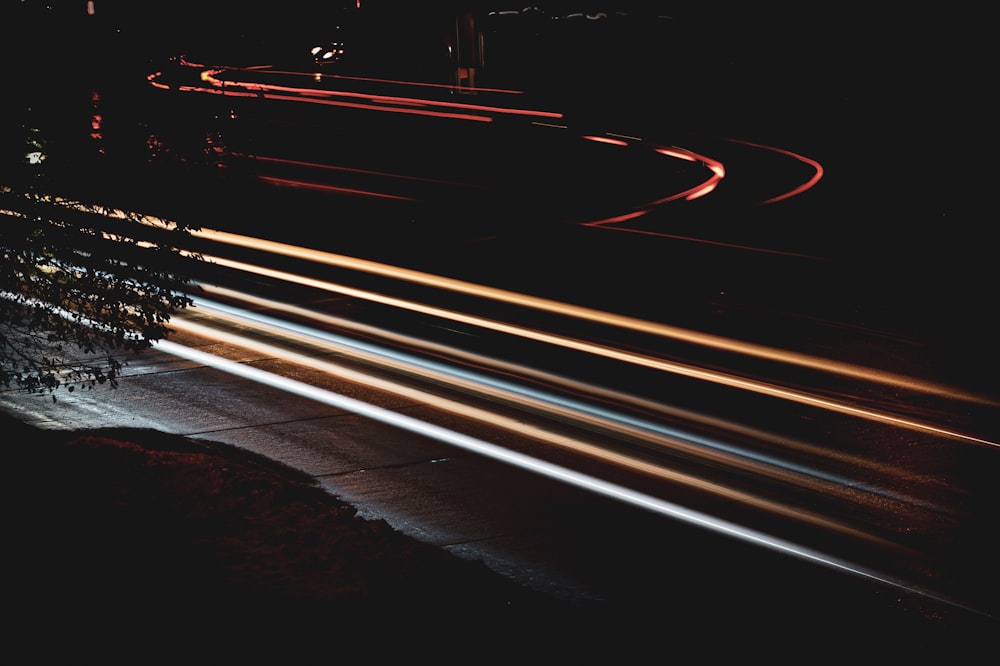 time lapse photography of vehicle lights