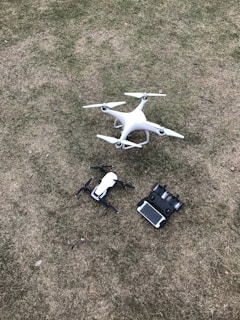 white DJI Mavic Pro drone set on grass