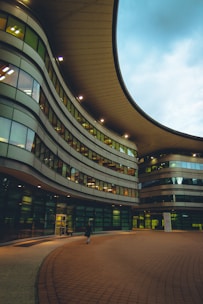 a circular building with a sky background
