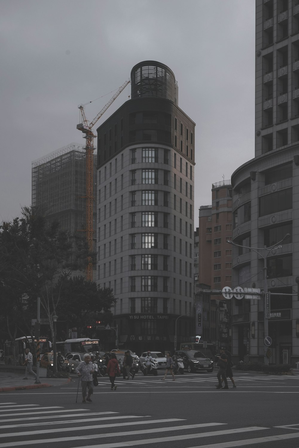 people crossing pedestrian lanes