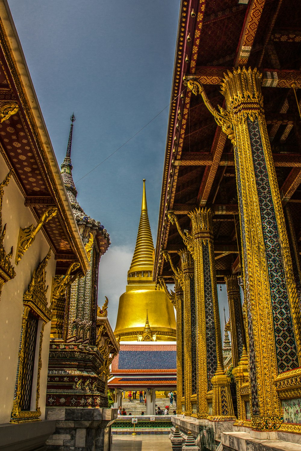 golden temple under blue skies during daytime