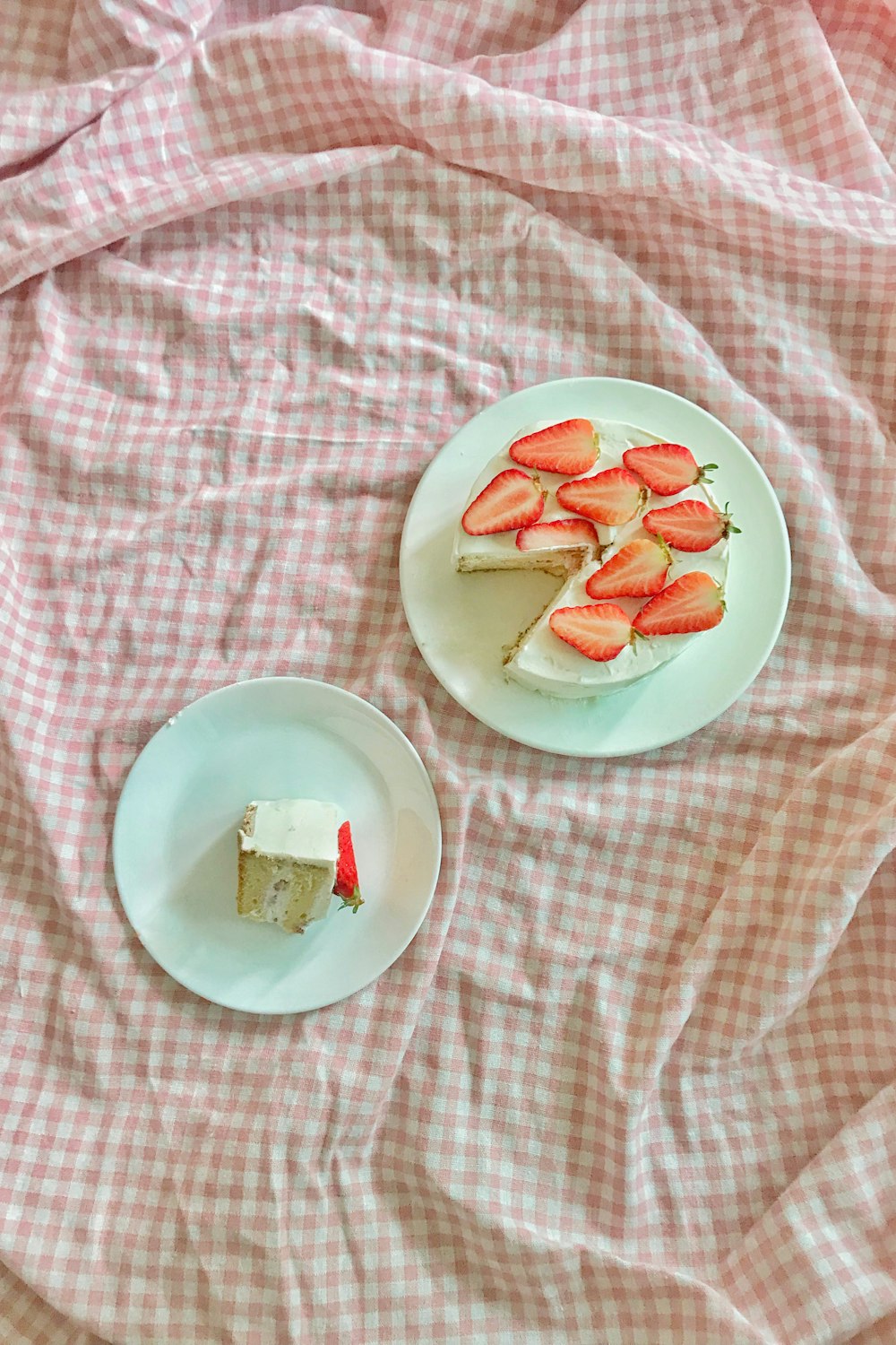 cake with strawberries on white ceramic plate