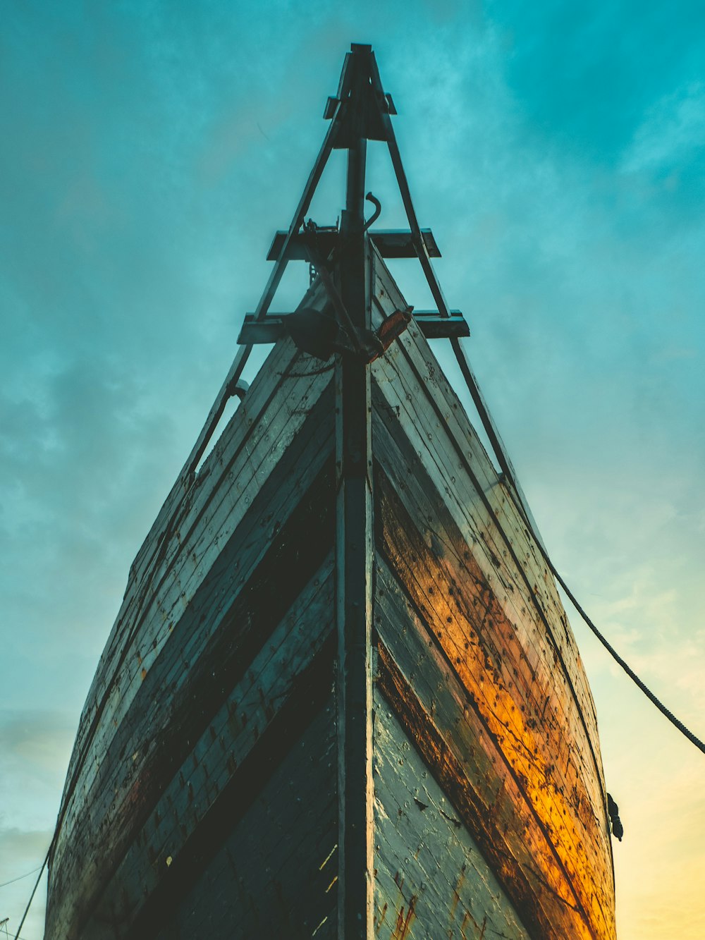 grey wooden boat during daytime