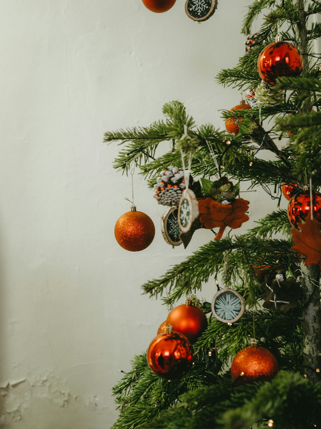 green Christmas tree with red baubles