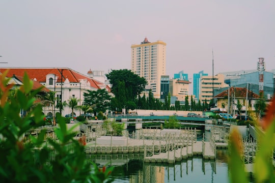 beige concrete buildings during daytime in Fatahillah Square Indonesia